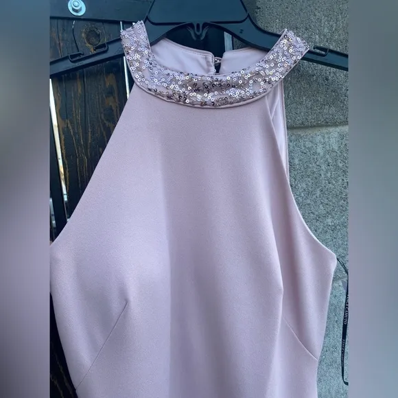 NWT Vince Camuto Halterneck Embellished dress has a high-cut hemline slit size 2