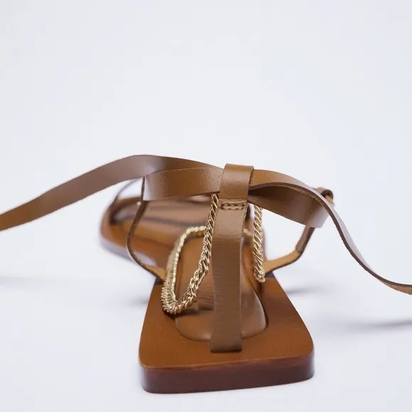 NWT. Zara Brown Tied Leather Flat Sandals with Chain. Size 6,5.
