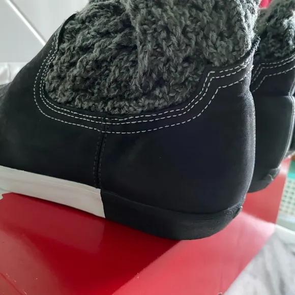 Puma Black and White Slip on sneakers