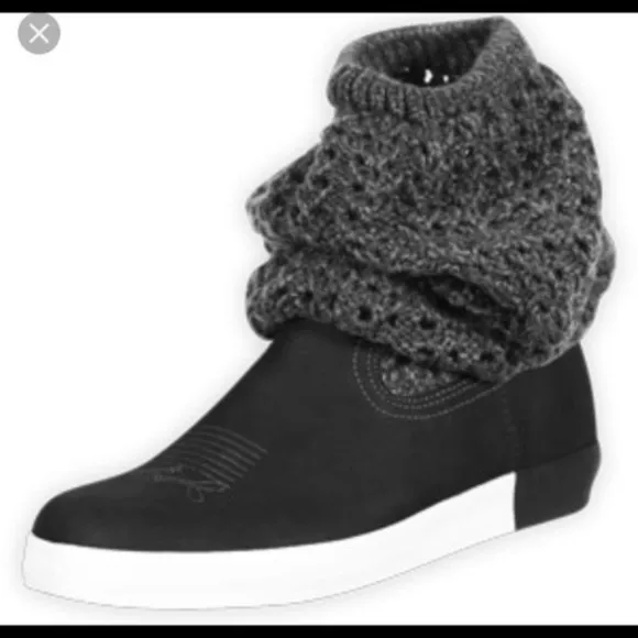 Puma Black and White Slip on sneakers