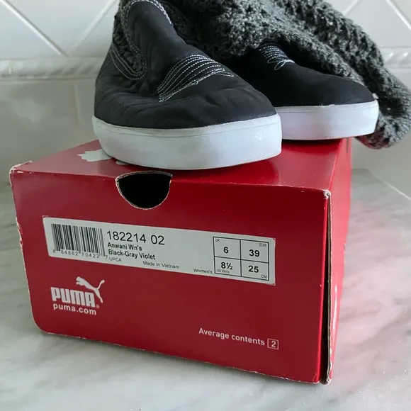 Puma Black and White Slip on sneakers