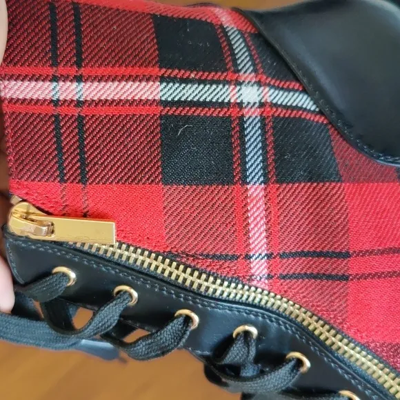 Shoe Dazzle Combat Boots feature a red and black Faux-leather Women's Size 9.