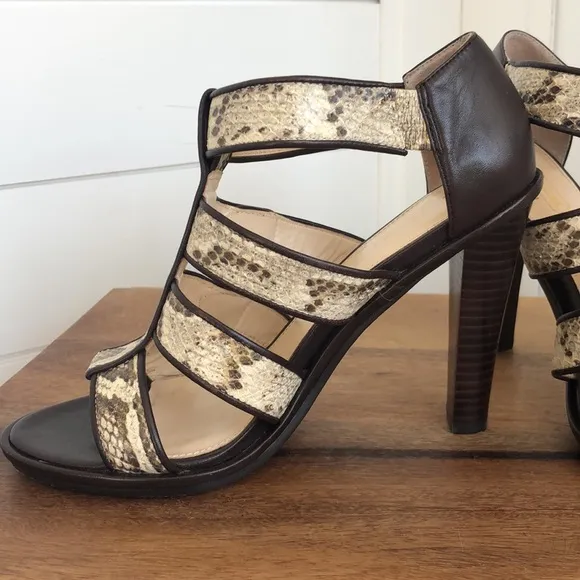 Stunning snakeskin print Tamarah heeled sandal with turn locks.