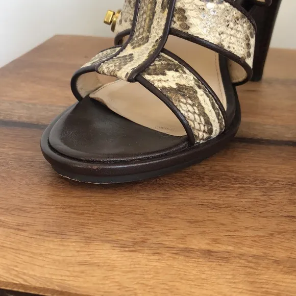 Stunning snakeskin print Tamarah heeled sandal with turn locks.