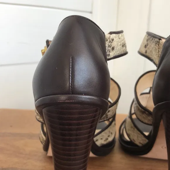 Stunning snakeskin print Tamarah heeled sandal with turn locks.