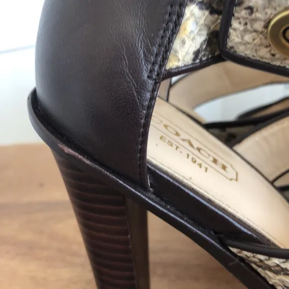 Stunning snakeskin print Tamarah heeled sandal with turn locks.