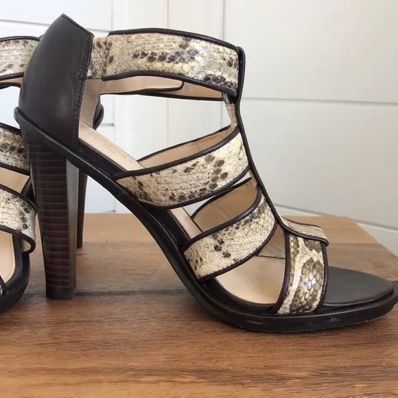 Stunning snakeskin print Tamarah heeled sandal with turn locks.