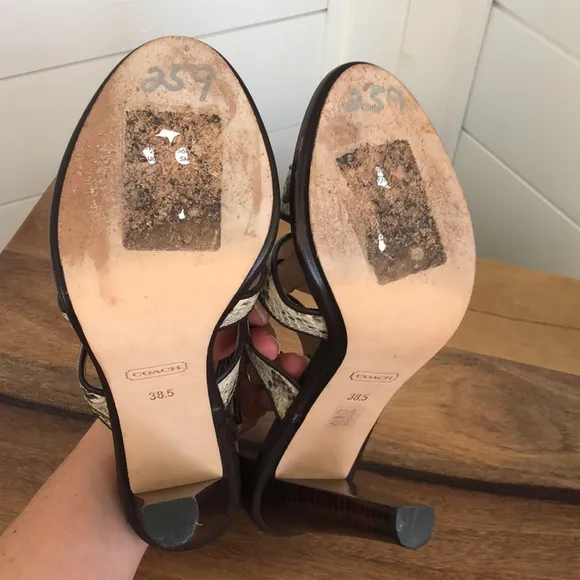Stunning snakeskin print Tamarah heeled sandal with turn locks.