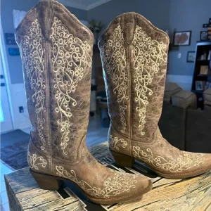 Tan Heeled Boots with Intricate Embroidery and Classic Design