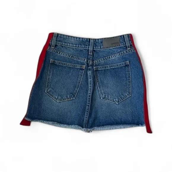 Three Carmar denim mini skirts, size 25. Two blue and one black.
