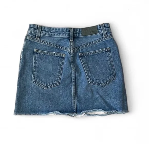 Three Carmar denim mini skirts, size 25. Two blue and one black.