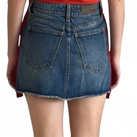 Three Carmar denim mini skirts, size 25. Two blue and one black.