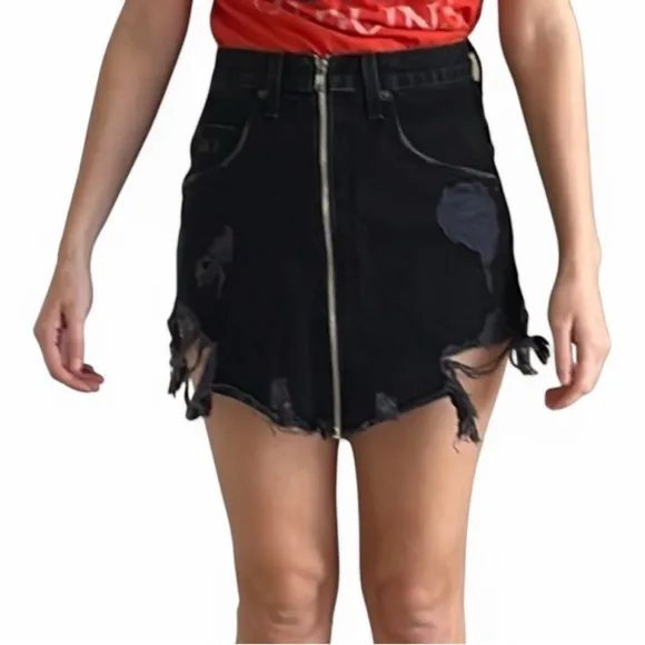 Three Carmar denim mini skirts, size 25. Two blue and one black.