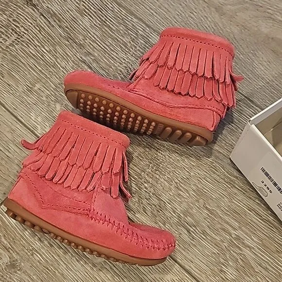 Toddler pink Minnetonka boots. Brand new. Never worn