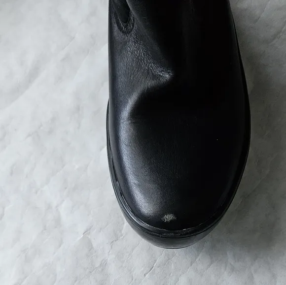 Tory Burch nylon puffer boots with micro suede lining