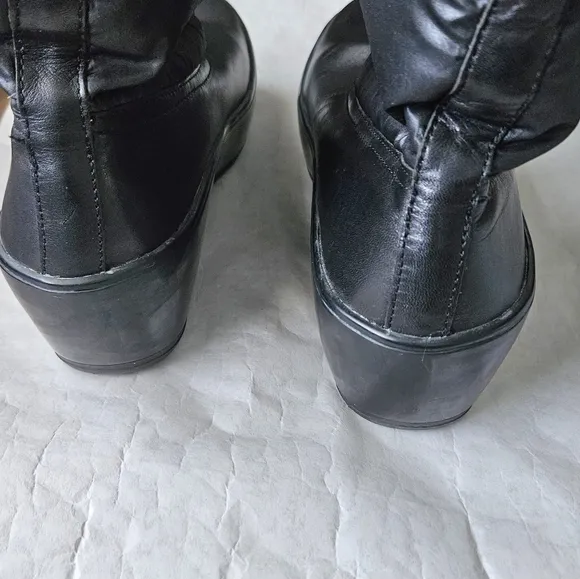 Tory Burch nylon puffer boots with micro suede lining