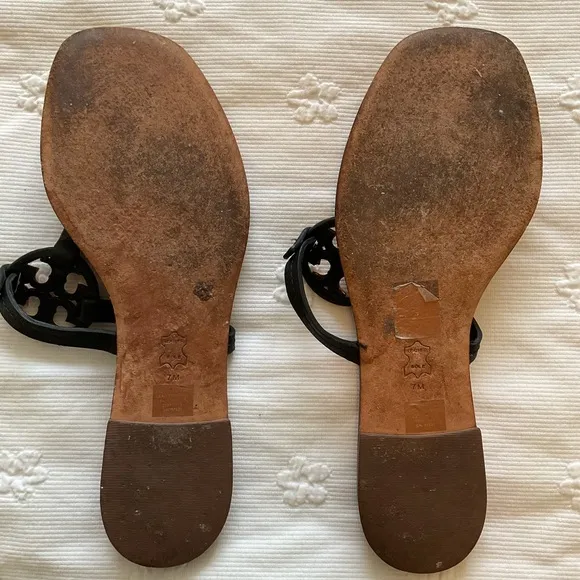 Tory Burch Sandals / Tory BurchT-medallion flat sandals size 7 Gold and Black