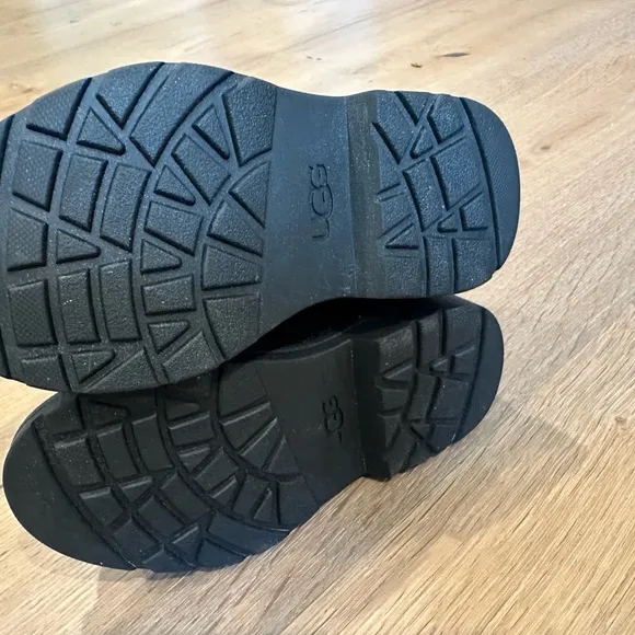 UGG Black Ankle Boots with Distressed Finish and Slip-On Style