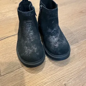 UGG Black Ankle Boots with Distressed Finish and Slip-On Style