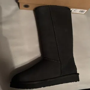 Ugg classic tall boots. Size 8. Brand new