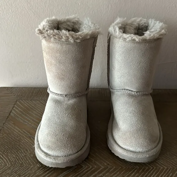 UGG gray boots with lavender bows. Little girl size 9
