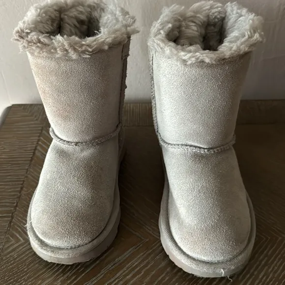 UGG gray boots with lavender bows. Little girl size 9