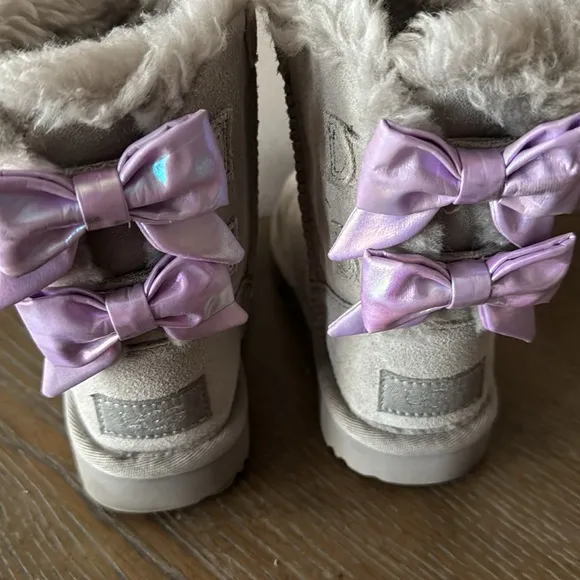 UGG gray boots with lavender bows. Little girl size 9