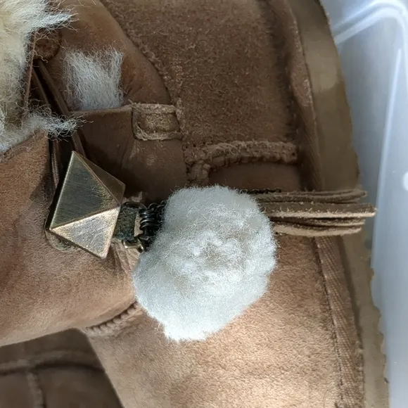 UGG Tan kid's slip-on boots Size 2