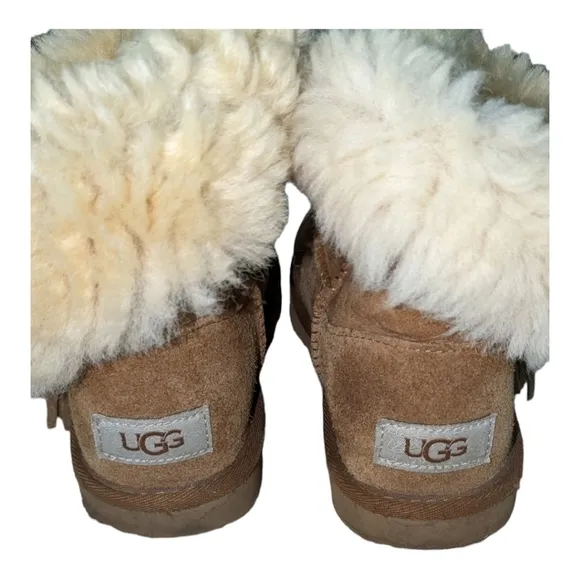UGG Tan kid's slip-on boots Size 2