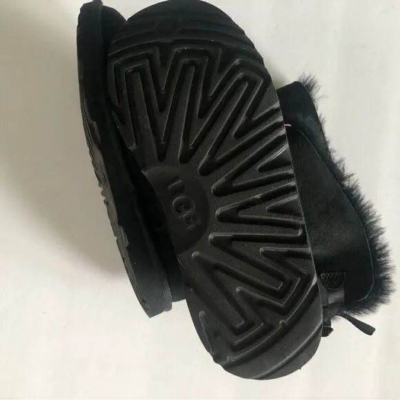 UGG two Bailey bow black ankle shearling lined slip on boots size 6