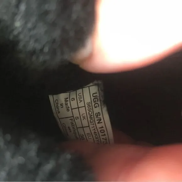 UGG two Bailey bow black ankle shearling lined slip on boots size 6