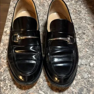 Women’s Black Gucci Leather Loafers